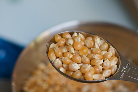measure 2 tablespoons of popcorn kernels