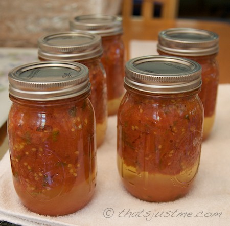 finished jars of canned tomatoes